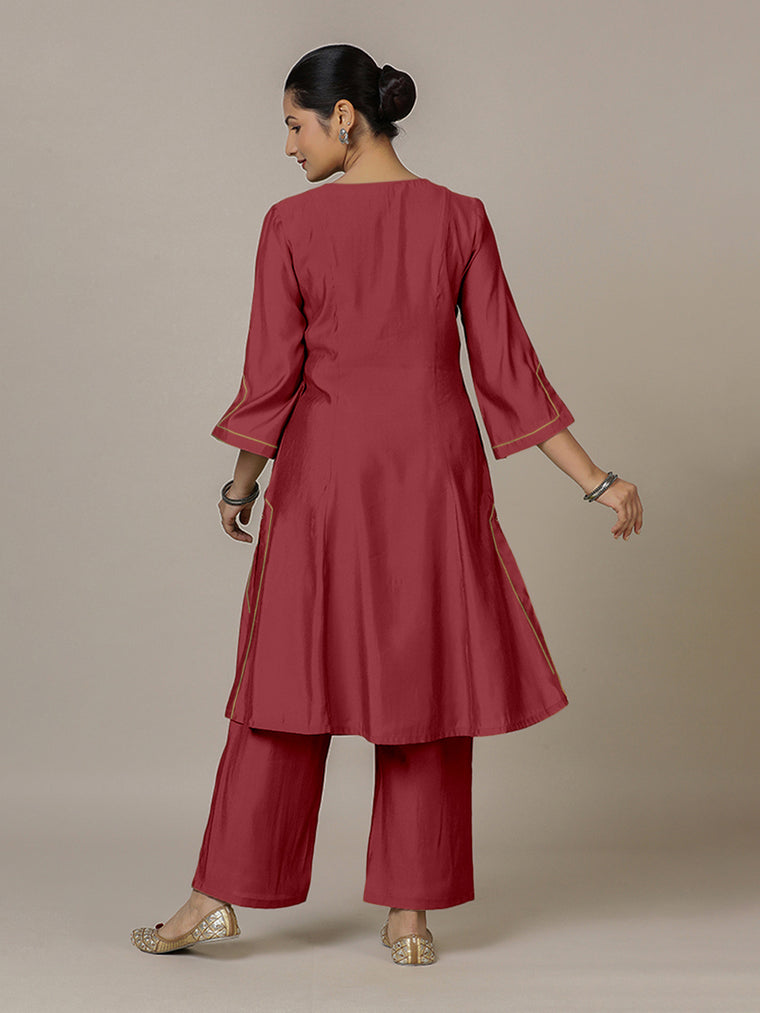Nimrat x Rozaana Kurta, in Red Viscose, featuring three quarter sleeves and round neck with splitline, made for daily & work.