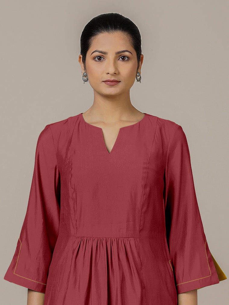 Nimrat x Rozaana Kurta, in Red Viscose, featuring three quarter sleeves and round neck with splitline, made for daily & work.