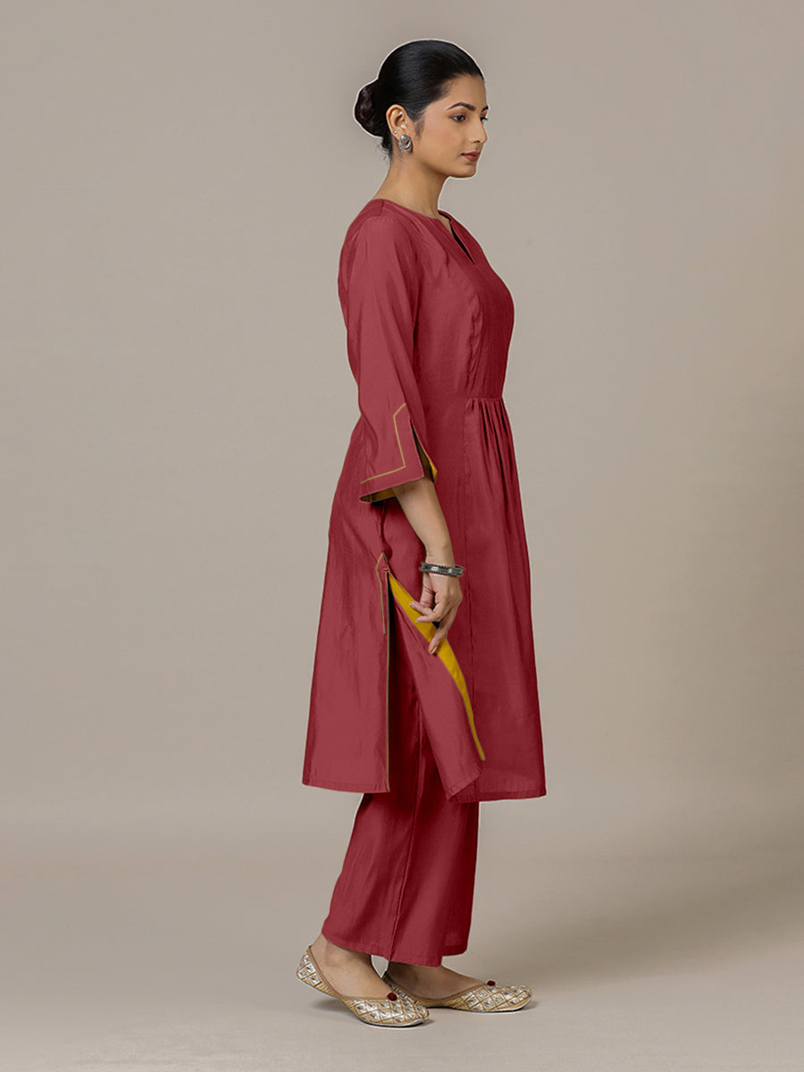 Nimrat x Rozaana Kurta, in Red Viscose, featuring three quarter sleeves and round neck with splitline, made for daily & work.