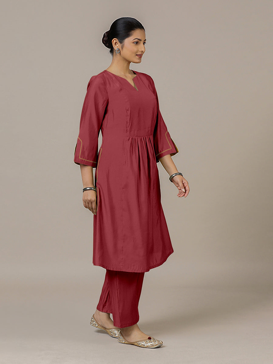 Nimrat x Rozaana Kurta, in Red Viscose, featuring three quarter sleeves and round neck with splitline, made for daily & work.