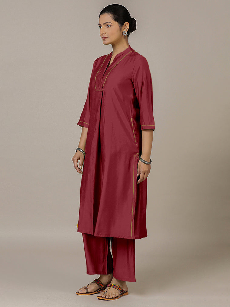 Paakhi x Rozaana Kurta, in Red Viscose, featuring three quarter sleeves and round neck with splitline, made for daily & work.