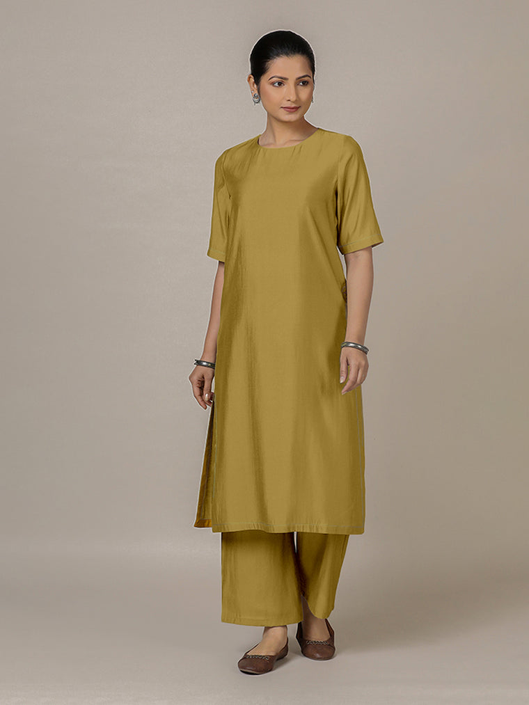 Riya x Rozaana Kurta, in Yellow Viscose, featuring elbow sleeves and jewel neckline, made for daily & work.