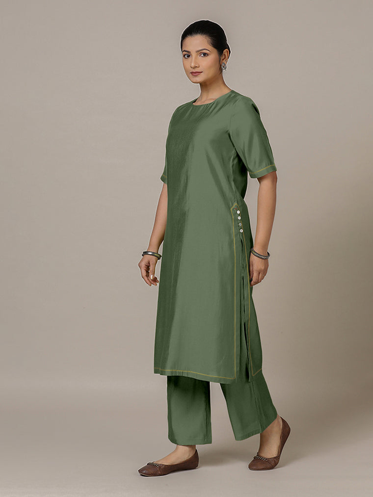 Riya x Rozaana Kurta, in Green Viscose, featuring elbow sleeves and jewel neckline, made for daily & work.
