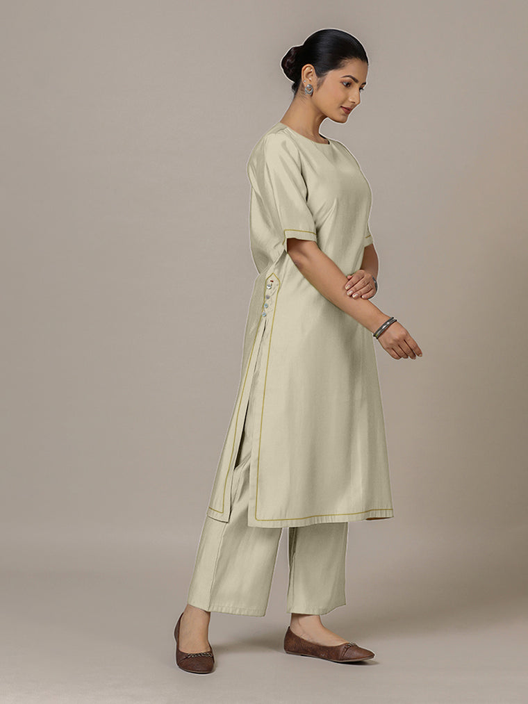 Riya x Rozaana Kurta, in Cream Viscose, featuring elbow sleeves and jewel neckline, made for daily & work.