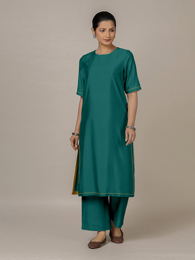 Riya x Rozaana Kurta, in Green Viscose, featuring elbow sleeves and jewel neckline, made for daily & work.