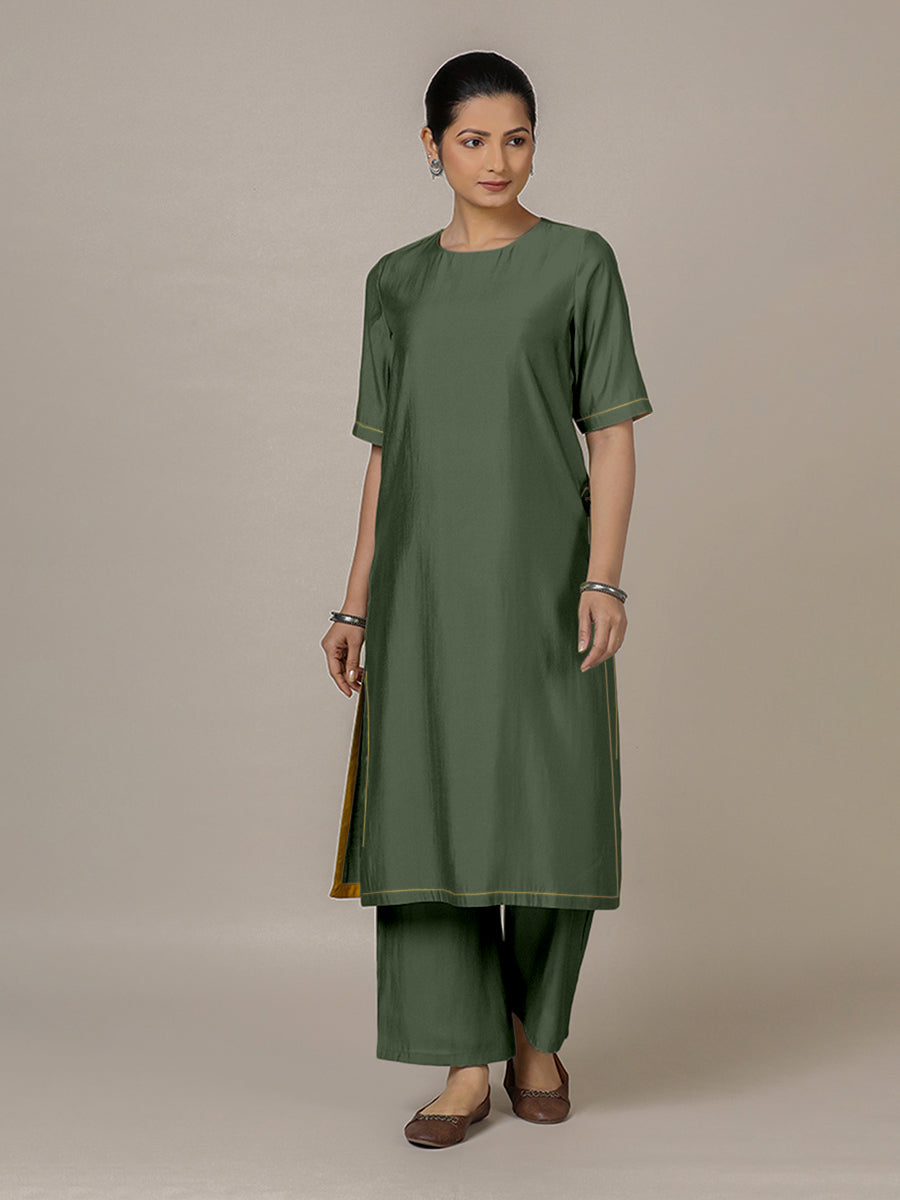 Riya x Rozaana Kurta, in Green Viscose, featuring elbow sleeves and jewel neckline, made for daily & work.