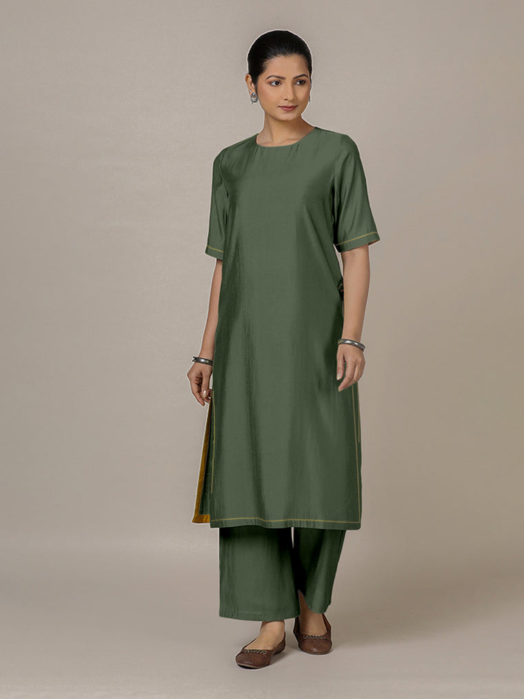 Riya x Rozaana Kurta, in Green Viscose, featuring elbow sleeves and jewel neckline, made for daily & work.