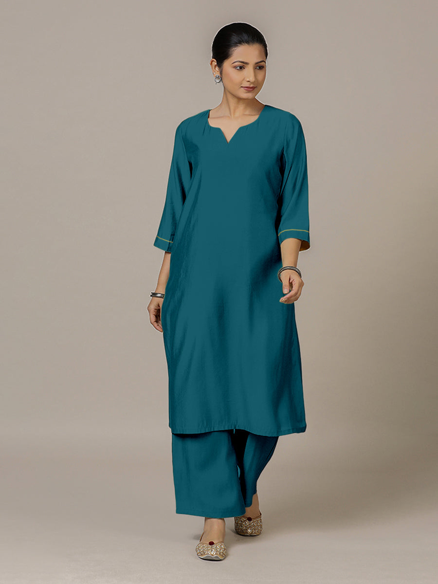 Sadaf x Rozaana Kurta, in Blue Viscose, featuring three quarter sleeves and round neck with splitline, made for daily & work.