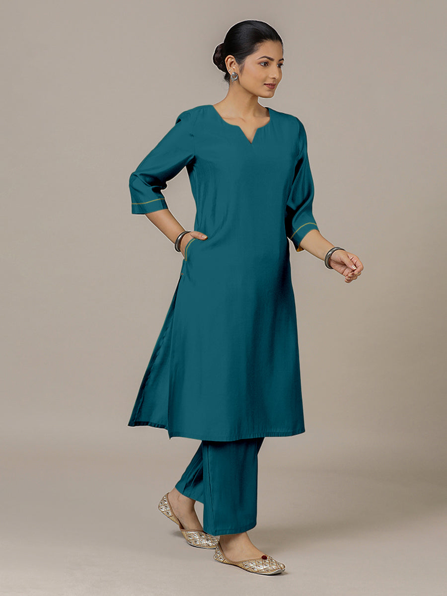 Sadaf x Rozaana Kurta, in Blue Viscose, featuring three quarter sleeves and round neck with splitline, made for daily & work.