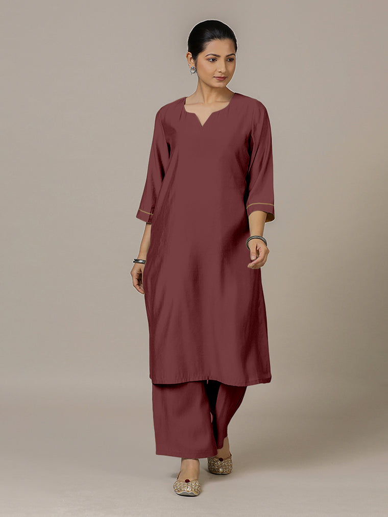 Sadaf x Rozaana Kurta, in Maroon Viscose, featuring three quarter sleeves and round neck with splitline.