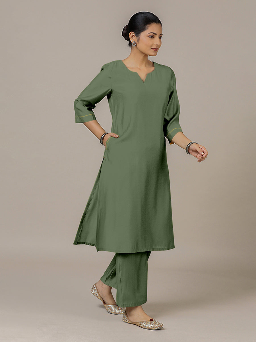 Sadaf x Rozaana Kurta, in Green Viscose, featuring three quarter sleeves and round neck with splitline.