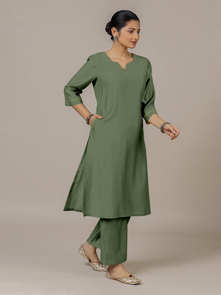 Sadaf x Rozaana Kurta, in Green Viscose, featuring three quarter sleeves and round neck with splitline.