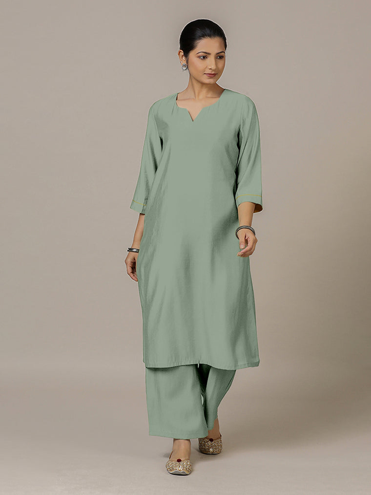 Sadaf x Rozaana Kurta, in Green Viscose, featuring three quarter sleeves and round neck with splitline.