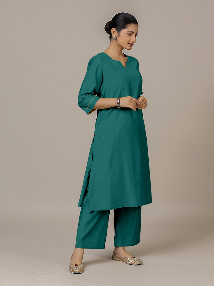 Sadaf x Rozaana Kurta, in Green Viscose, featuring three quarter sleeves and round neck with splitline.