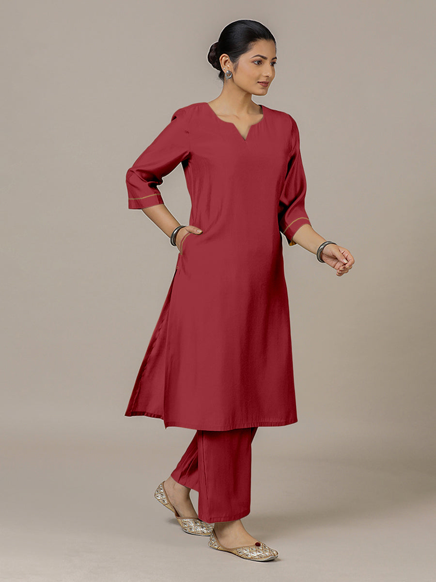 Sadaf x Rozaana Kurta, in Red Viscose, featuring three quarter sleeves and round neck with splitline, made for daily & work.