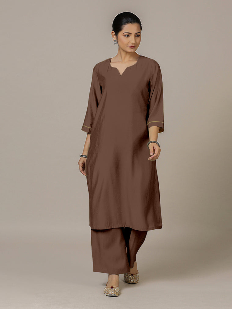 Sadaf x Rozaana Kurta, in Brown Viscose, featuring three quarter sleeves and round neck with splitline.
