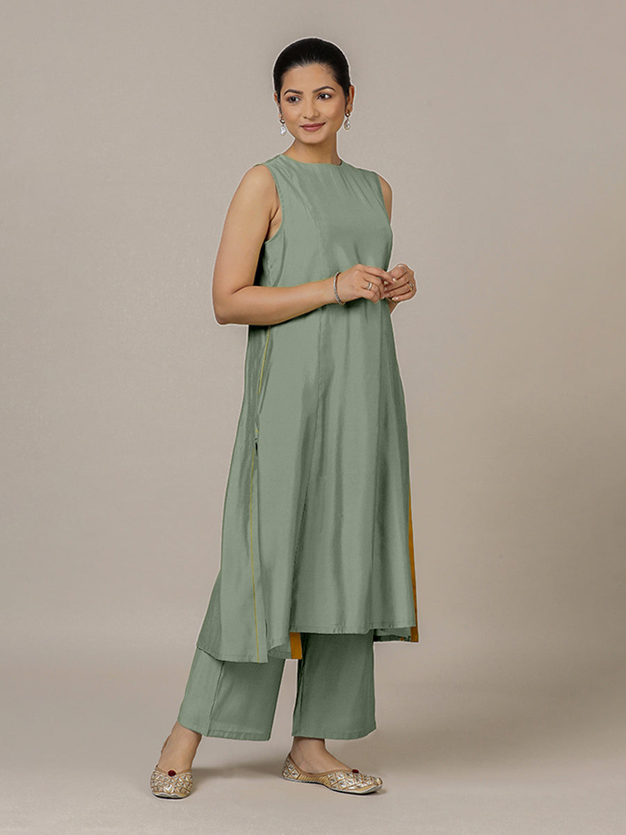 Sameera x Rozaana Kurta, in Green Viscose, featuring sleeveless and jewel neckline, made for daily & work.