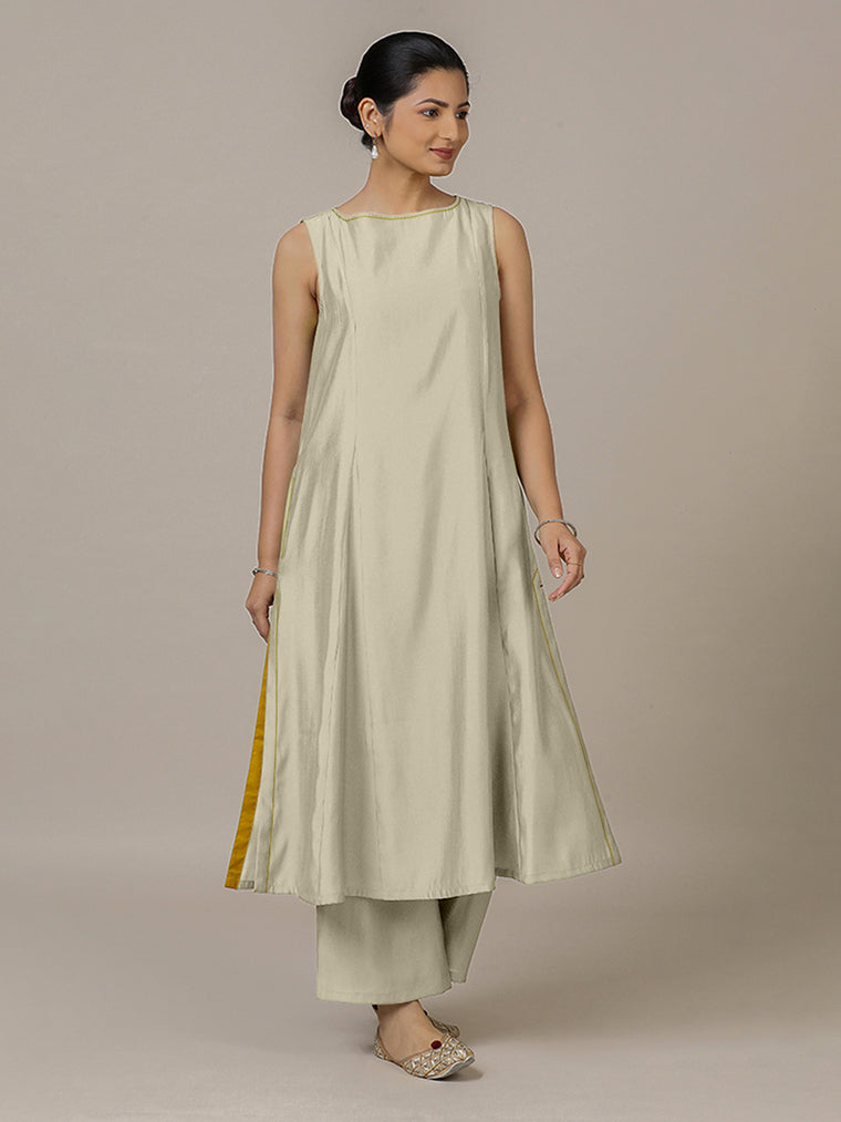 Sarah x Rozaana Kurta, in Cream Viscose, featuring sleeveless and boat neckline, made for daily & work.