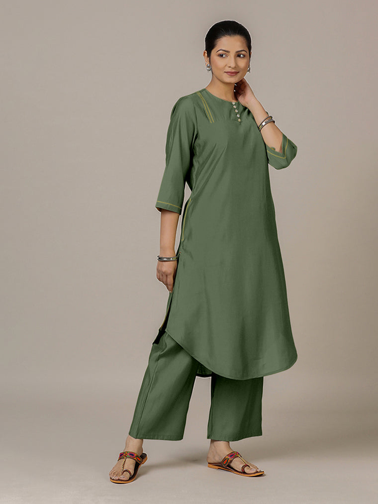 Urvi x Rozaana Kurta, in Green Viscose, featuring three quarter sleeves and round neckline, made for daily & work.