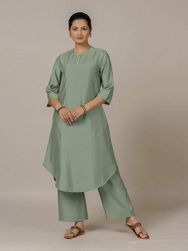 Urvi x Rozaana Kurta, in Green Viscose, featuring three quarter sleeves and round neckline, made for daily & work.