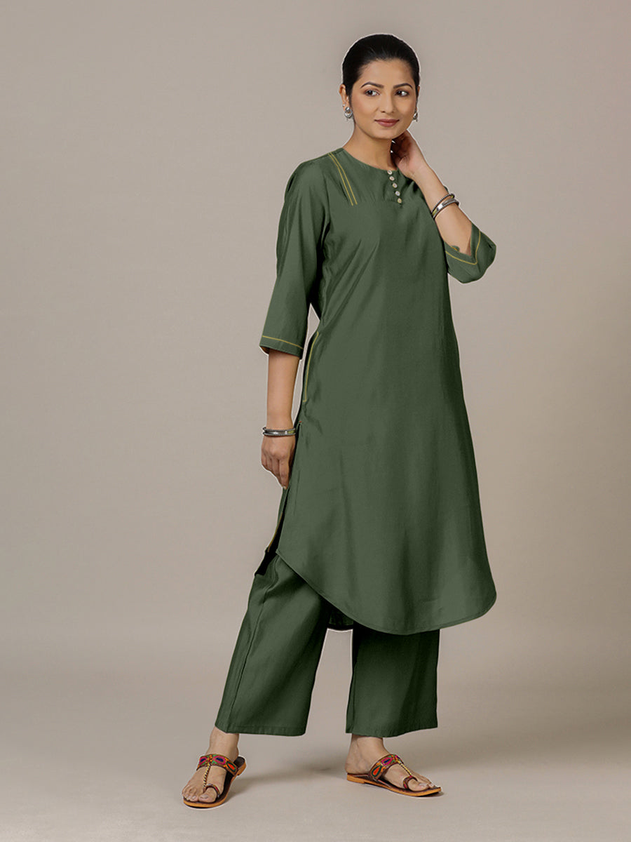 Urvi x Rozaana Kurta, in Green Viscose, featuring three quarter sleeves and round neckline, made for daily & work.