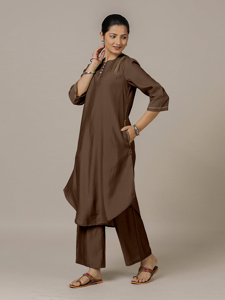 Urvi x Rozaana Kurta, in Brown Viscose, featuring three quarter sleeves and round neckline, made for daily & work.