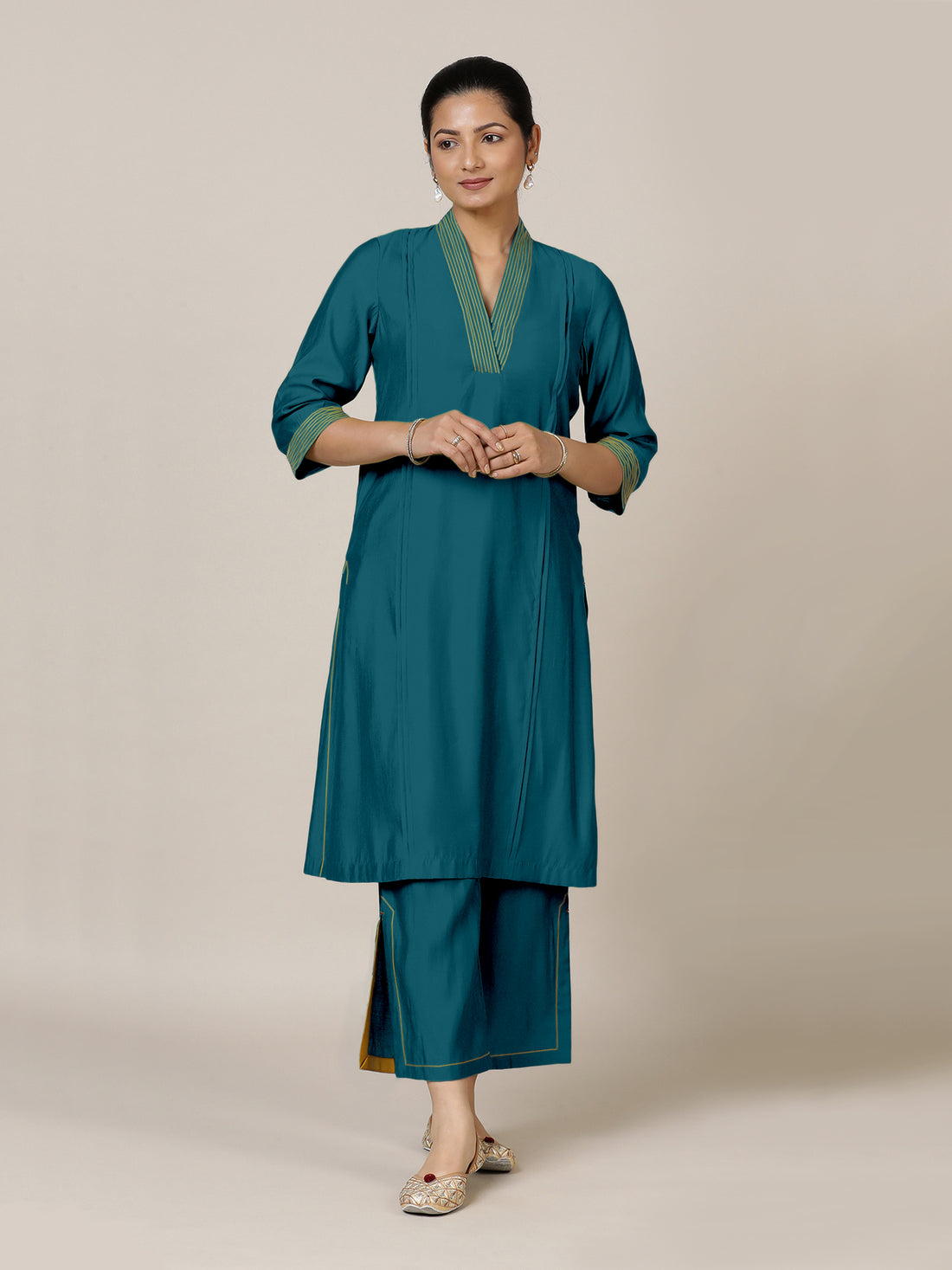 Vanya x Rozaana Kurta, in Green Viscose, featuring three quarter sleeves and band collar neckline, made for daily & work.