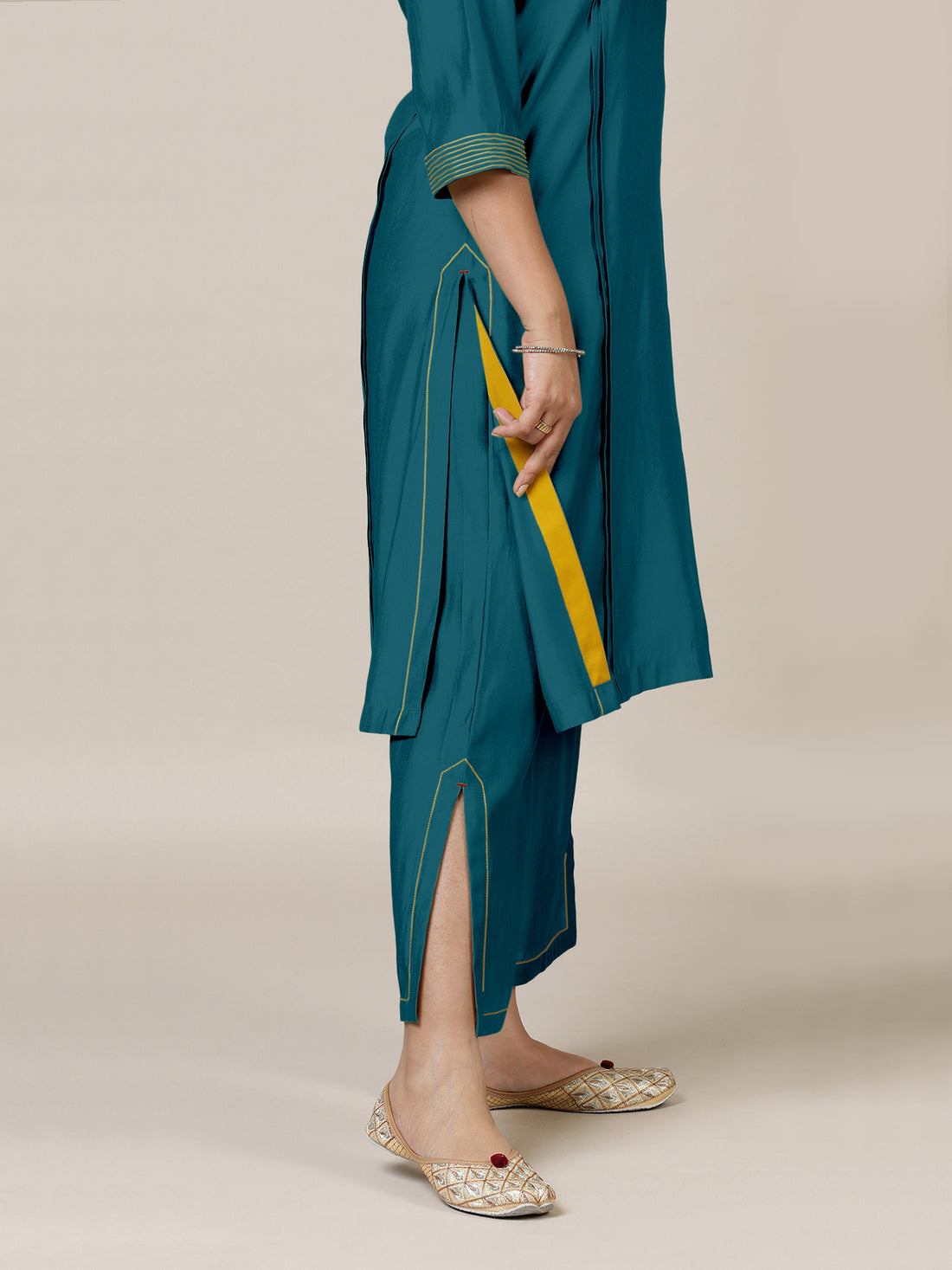 Vanya x Rozaana Kurta, in Green Viscose, featuring three quarter sleeves and band collar neckline, made for daily & work.