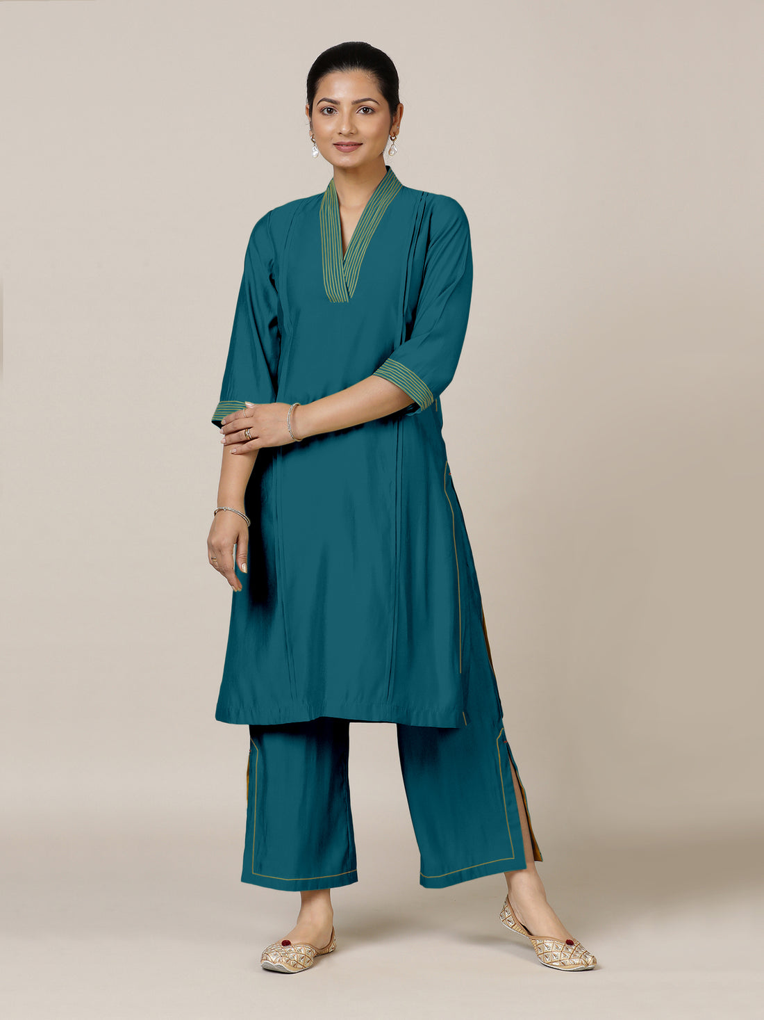 Vanya x Rozaana Kurta, in Green Viscose, featuring three quarter sleeves and band collar neckline, made for daily & work.
