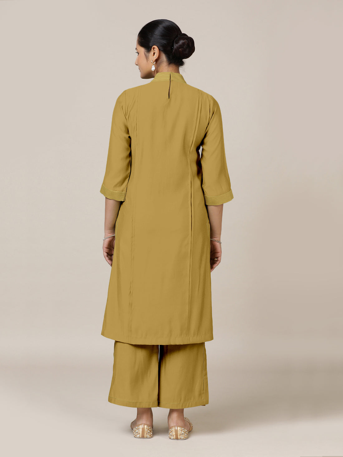 Vanya x Rozaana Kurta, in Yellow Viscose, featuring three quarter sleeves and band collar neckline, made for daily & work.