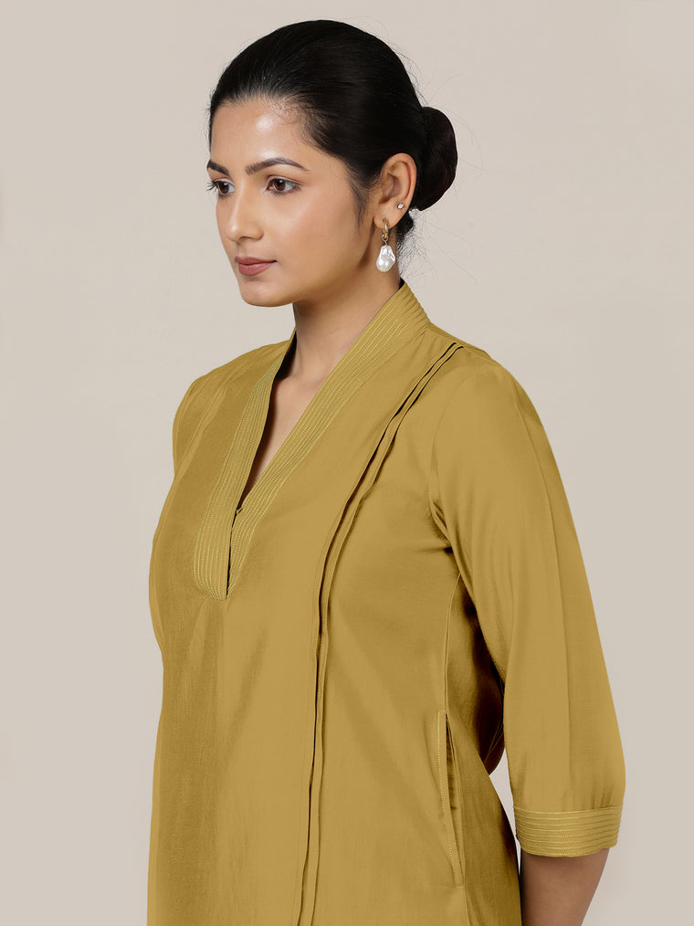 Vanya x Rozaana Kurta, in Yellow Viscose, featuring three quarter sleeves and band collar neckline, made for daily & work.