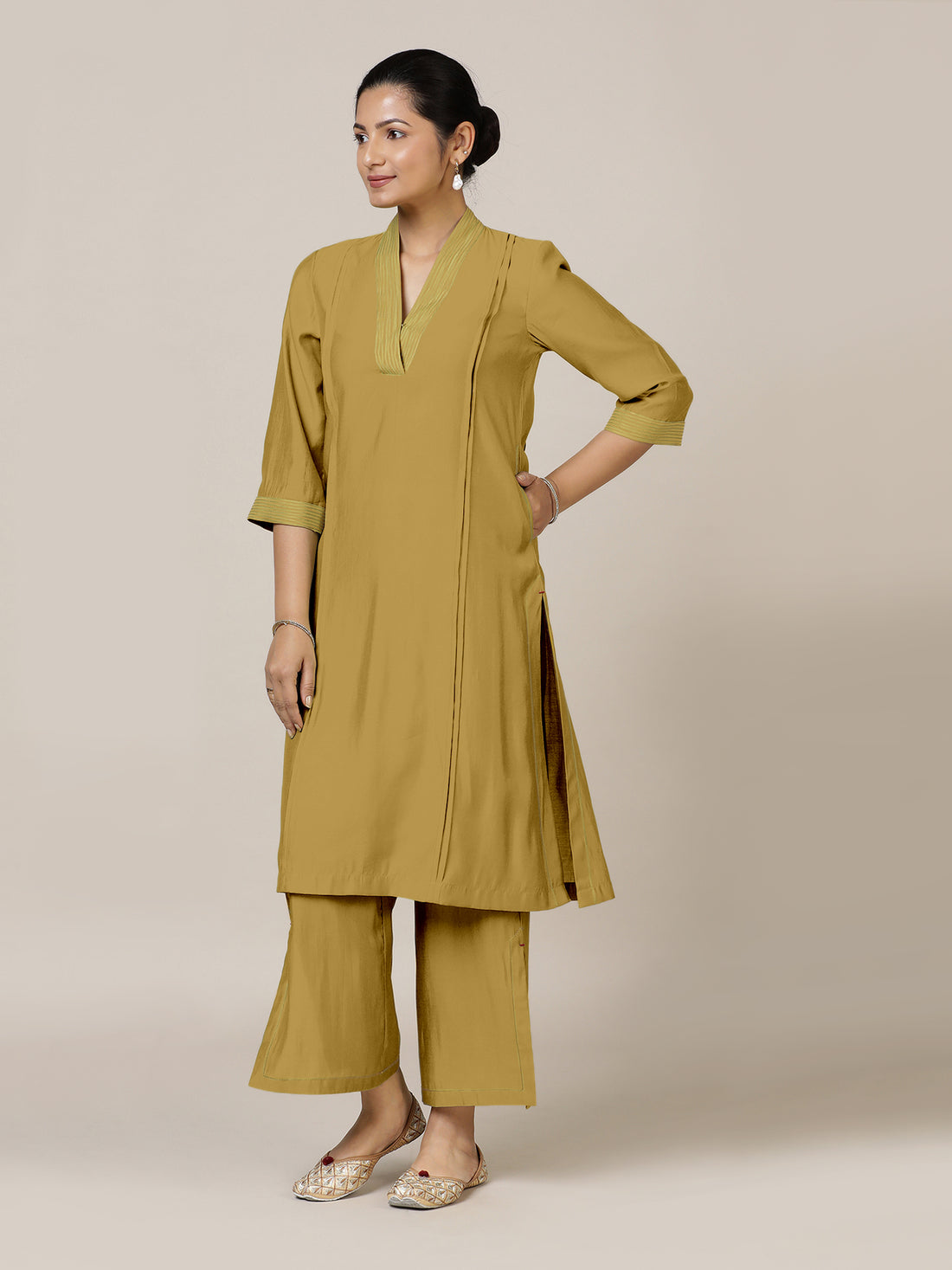 Vanya x Rozaana Kurta, in Yellow Viscose, featuring three quarter sleeves and band collar neckline, made for daily & work.
