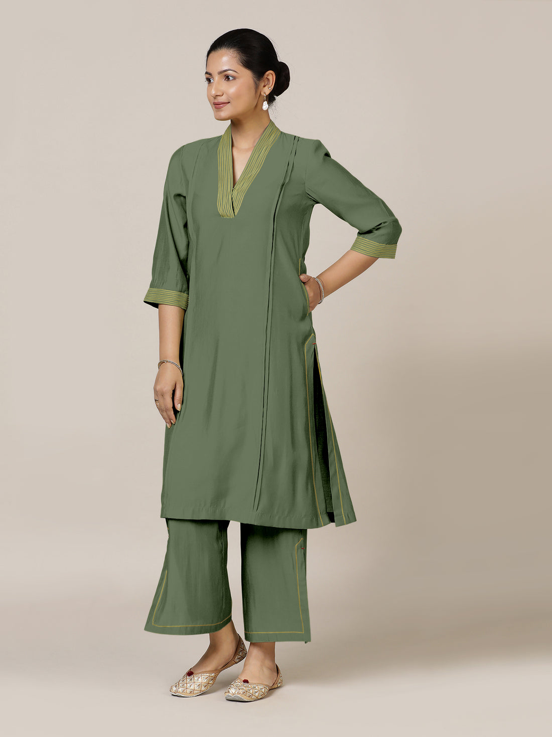 Vanya x Rozaana Kurta, in Green Viscose, featuring three quarter sleeves and band collar neckline, made for daily & work.