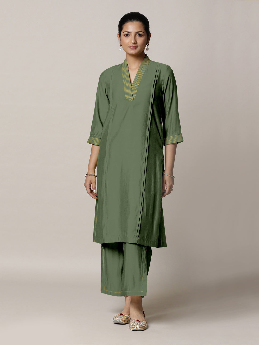 Vanya x Rozaana Kurta, in Green Viscose, featuring three quarter sleeves and band collar neckline, made for daily & work.