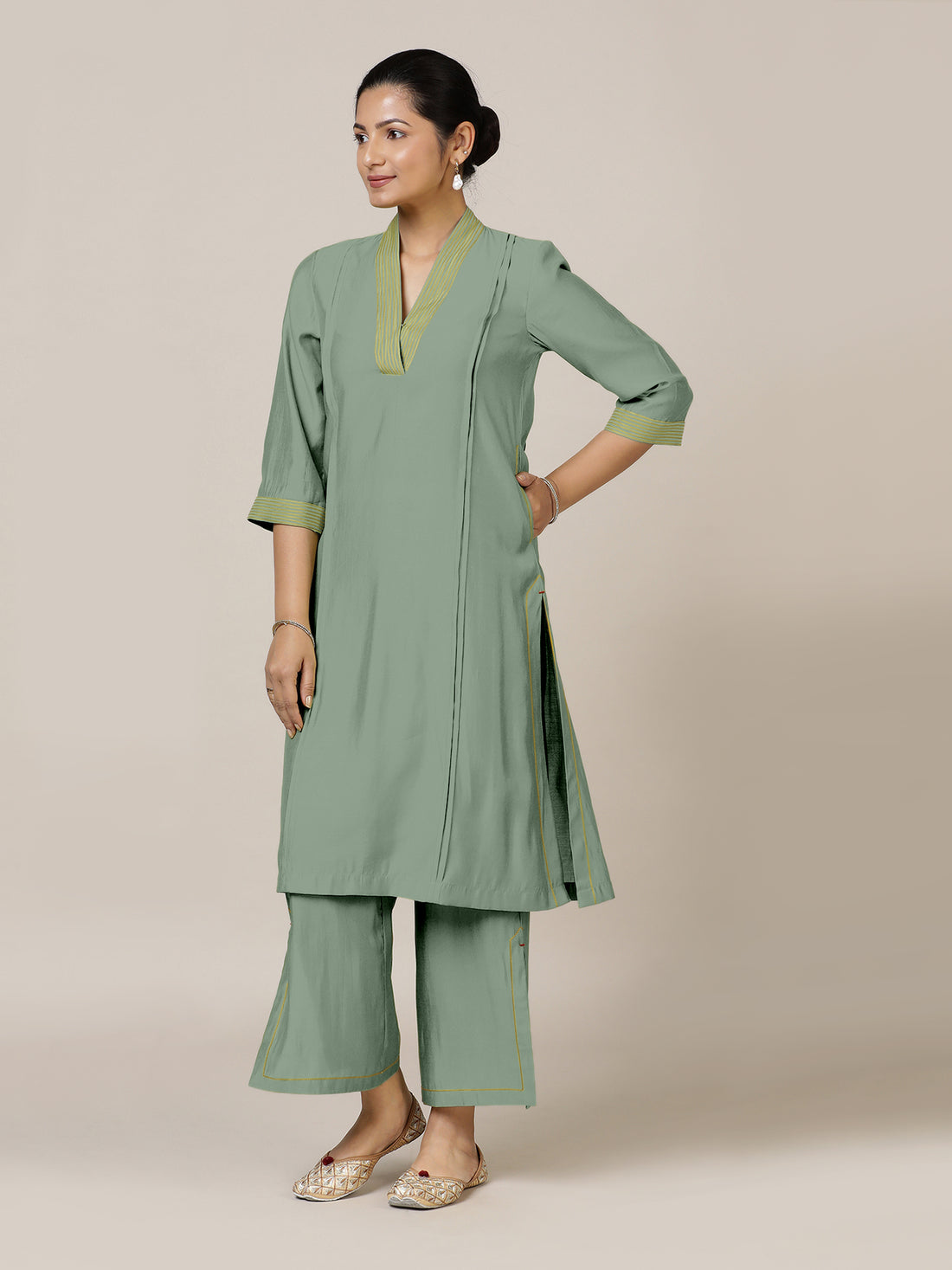 Vanya x Rozaana Kurta, in Green Viscose, featuring three quarter sleeves and band collar neckline, made for daily & work.