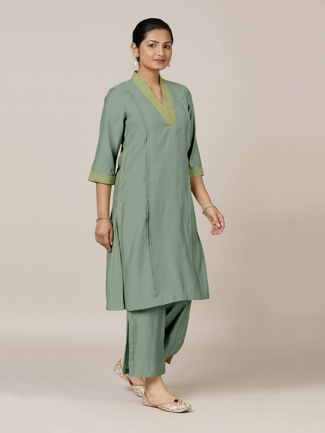 Vanya x Rozaana Kurta, in Green Viscose, featuring three quarter sleeves and band collar neckline, made for daily & work.