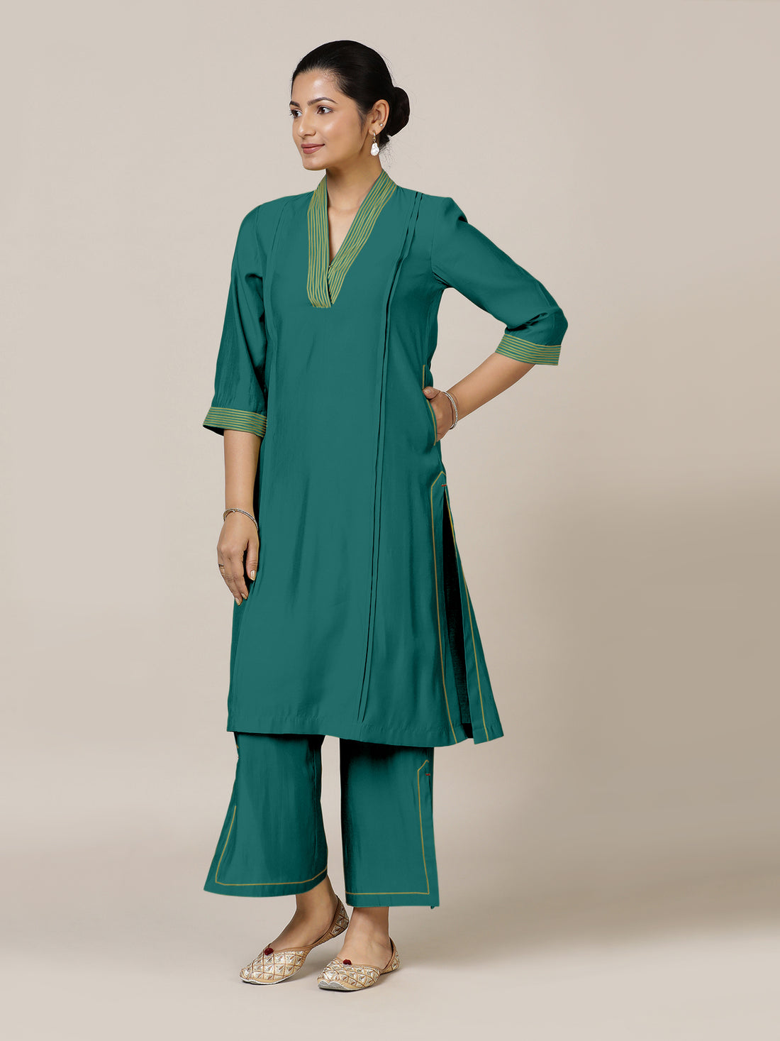 Vanya x Rozaana Kurta, in Green Viscose, featuring three quarter sleeves and band collar neckline, made for daily & work.