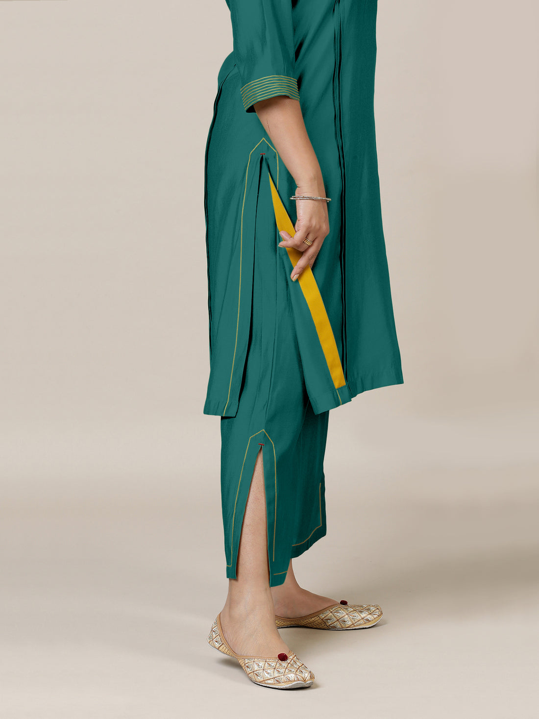 Vanya x Rozaana Kurta, in Green Viscose, featuring three quarter sleeves and band collar neckline, made for daily & work.
