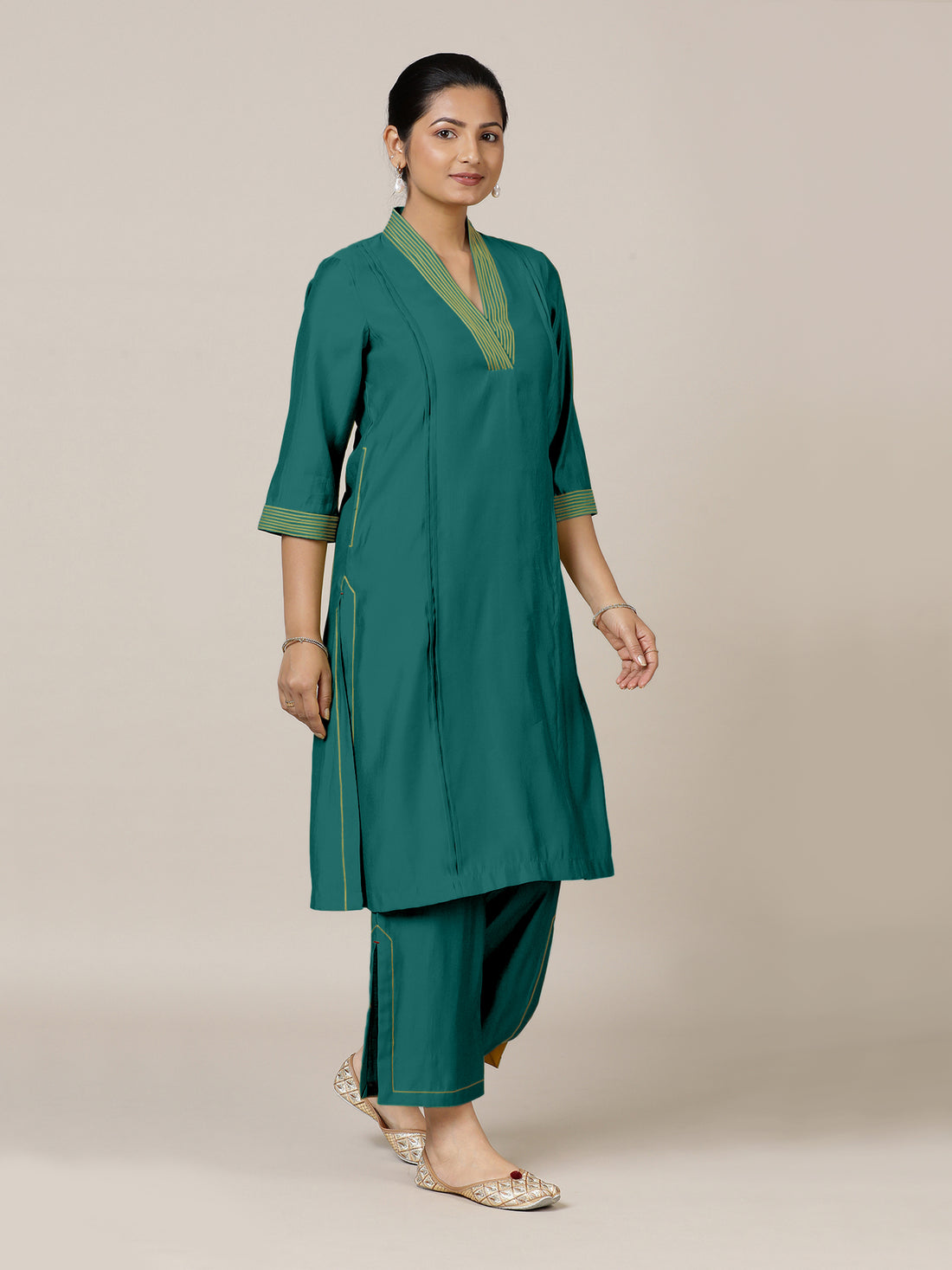 Vanya x Rozaana Kurta, in Green Viscose, featuring three quarter sleeves and band collar neckline, made for daily & work.