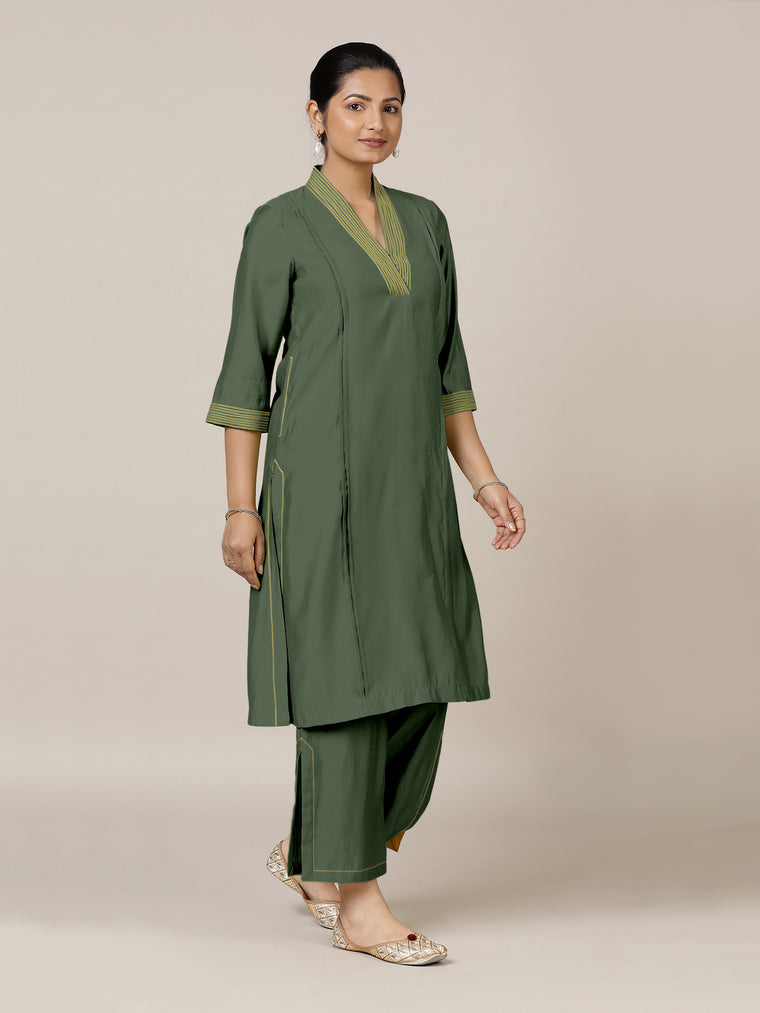 Vanya x Rozaana Kurta, in Green Viscose, featuring three quarter sleeves and band collar neckline, made for daily & work.