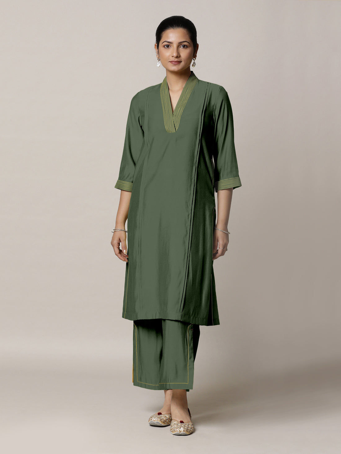 Vanya x Rozaana Kurta, in Green Viscose, featuring three quarter sleeves and band collar neckline, made for daily & work.