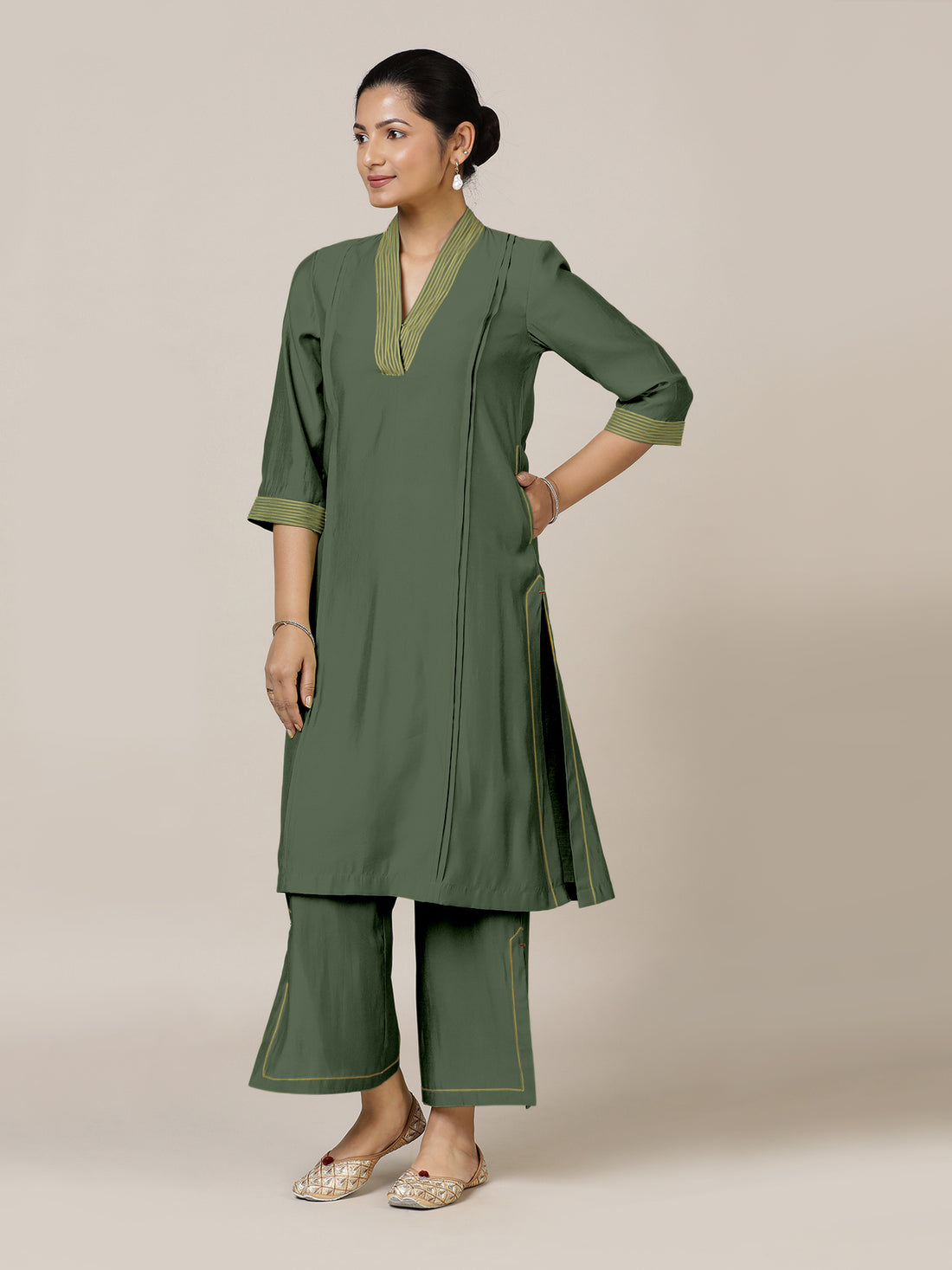 Vanya x Rozaana Kurta, in Green Viscose, featuring three quarter sleeves and band collar neckline, made for daily & work.