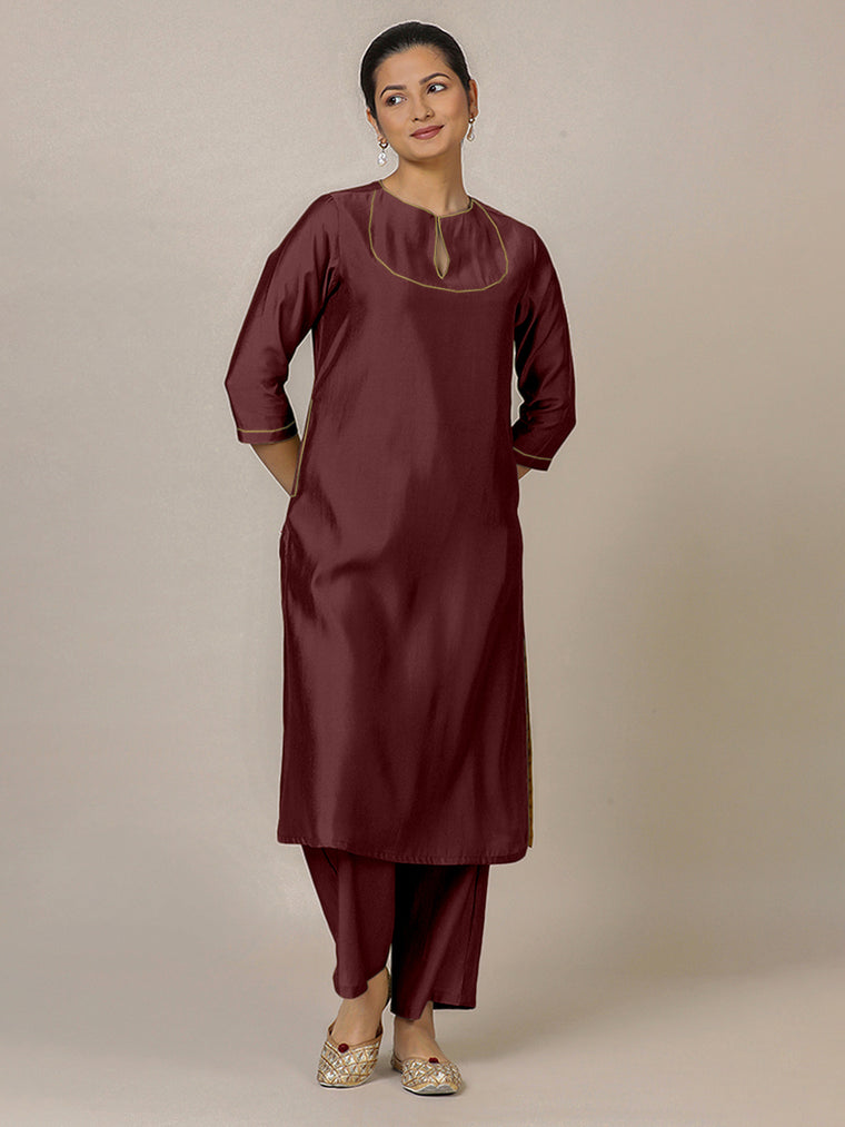 Zoya x Rozaana Kurta, in Maroon Viscose, featuring three quarter sleeves and keyhole neckline, made for daily & work.