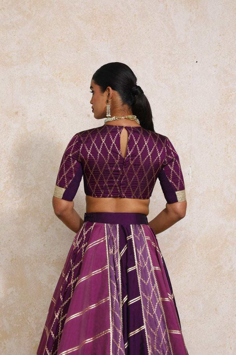 Afsana x Tyohaar Lehenga Set, in Purple Viscose Silk Brocade, featuring elbow sleeves and jewel neckline (view 2).