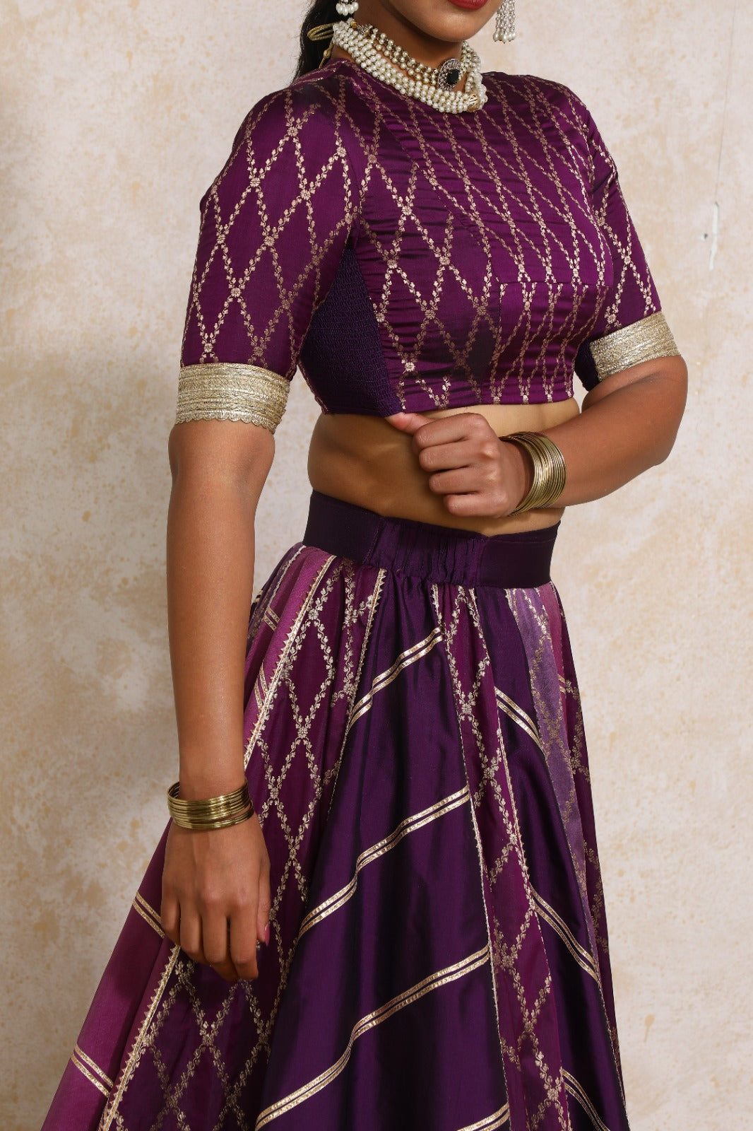 Afsana x Tyohaar Lehenga Set, in Purple Viscose Silk Brocade, featuring elbow sleeves and jewel neckline (view 8).