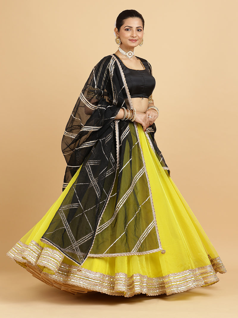 Farah Aziza 4-Pc Lehenga Set x Tyohaar | Lemon Yellow Lehenga, Charcoal Black Blouse with Chandni Black Dupatta and Cancan Skirt-Binks