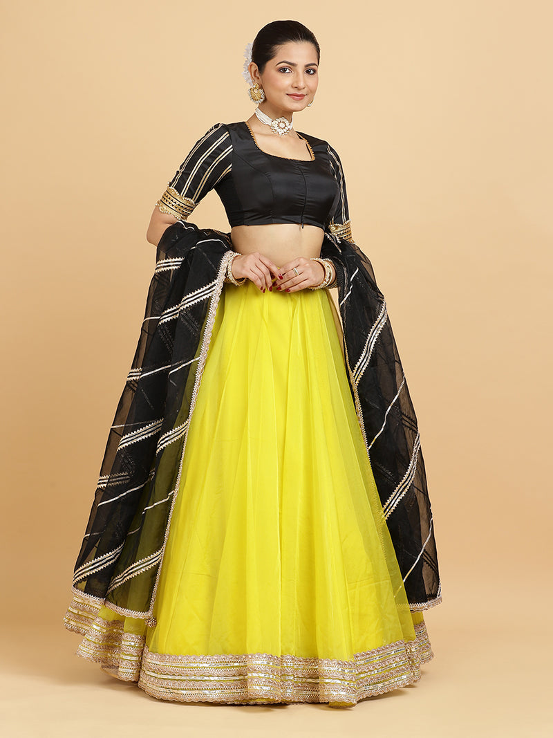 Farah Aziza 4-Pc Lehenga Set x Tyohaar | Lemon Yellow Lehenga, Charcoal Black Blouse with Chandni Black Dupatta and Cancan Skirt-Binks