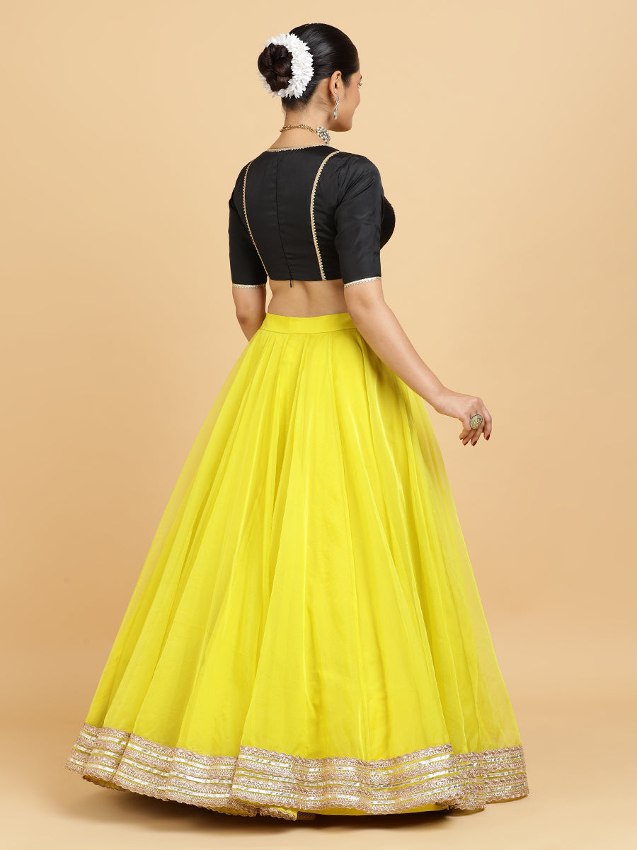 Farah Zeenat 4-Pc Lehenga Set x Tyohaar, in Yellow, featuring elbow sleeves and v-neckline, made for party & festive (view 2).