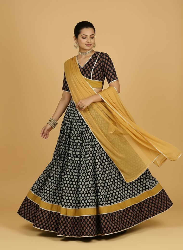 Gaurav x Tyohaar Lehenga Set, in Black 100% Cotton - Block Printed, featuring elbow sleeves and v-neckline.