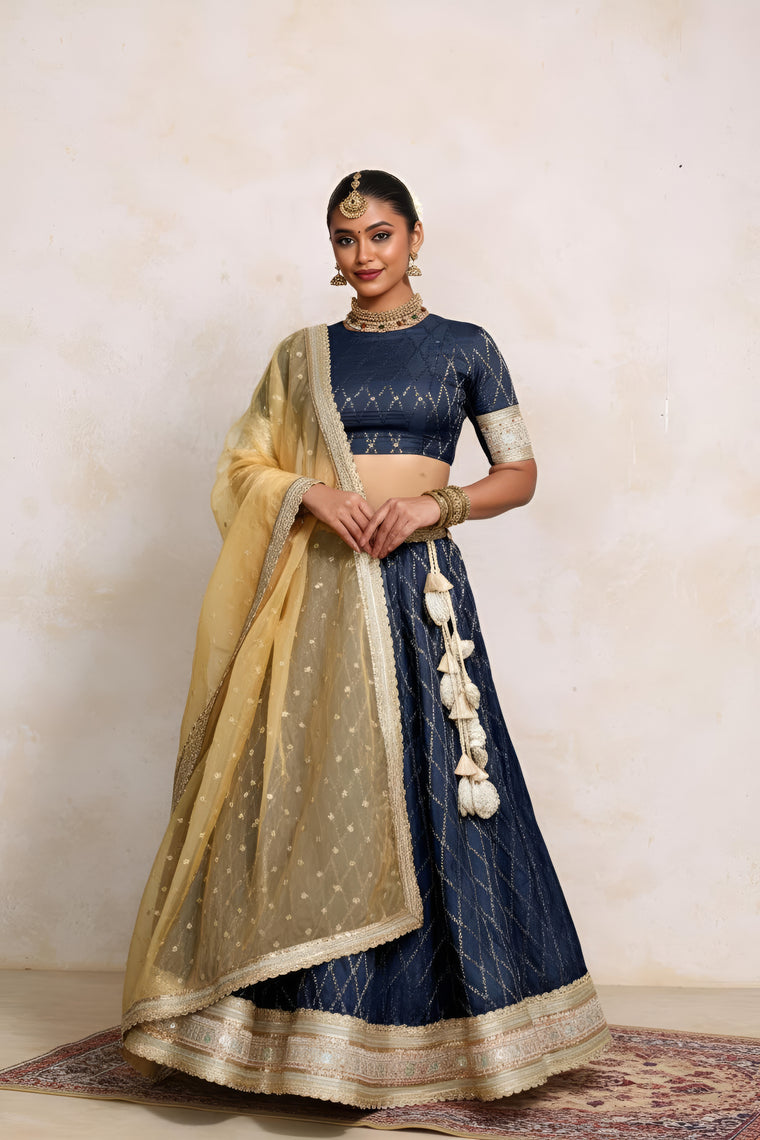 Hoor x Tyohaar Lehenga Set, in Blue Viscose Silk Brocade, featuring elbow sleeves and jewel neckline.